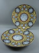 A good pair of Sévres style pâte-sur-pâte inspired chargers with blue and white enamel roundels