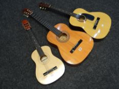 Three acoustic guitars