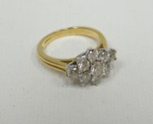 An 18ct yellow gold nine diamond floral-cluster ring, 4.63gms