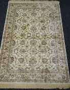 Ivory ground Kashmir rug, Ziegler design, 170 x 120 cms