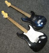 Two black Encore electric guitars