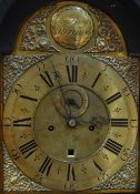 An early black Japanned eight-day longcase clock with brass dial bearing Roman numerals and inner