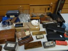 A large collection of mixed vintage medical profession items and accessories, including glassware,