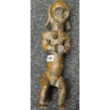 An Equatorial Africa, probably Fang-tribe (Gabon), carved seated reliquary-type figure, 37cms high