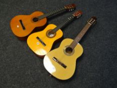 Three acoustic guitars