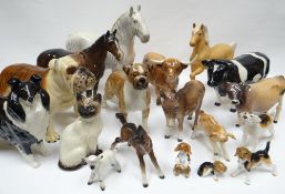 A group of Beswick animals including standing Boxer-dog, standing Border Collies, standing Bull Dog,