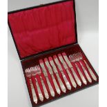 An elegant cased-set of twelve mother-of-pearl handled and EPNS fish-knives and forks