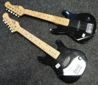 Two black Eleca child size electric guitars