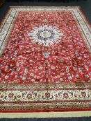 Red ground Kashmir carpet, floral medallion design, 380 x 280 cms