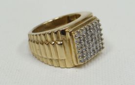 A 9ct yellow gold gent's diamond cluster ring, visual estimate 1ct total, 11.2gms