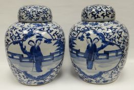 Chinese blue and white pair of ginger jars with covers, decorated with two opposing panels to each