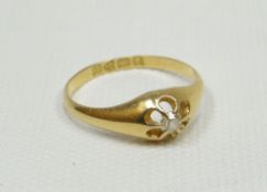 An 18ct yellow gold diamond solitaire ring, size 'M'
