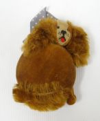 A rare novelty Schuco compact in the form of a spaniel dog with brown plush hair and body, the