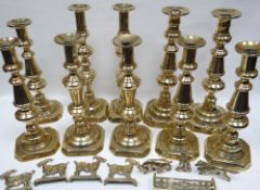 Two trios and two pairs (10) antique brass candle-holders, various sizes; four miniature brass