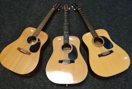 Three acoustic guitars