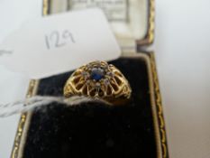An antique 18ct yellow gold diamond and sapphire floral ring, 3.48gms