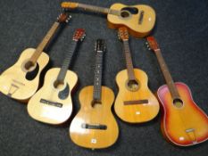 Six various acoustic guitars in mixed condition