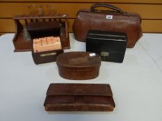 Sundry GP items including a Gladstone-type Doctor-on-call leather bag, a dispensary glasses stand, a