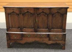 A nineteenth century oak Lancashire chest (adapted)