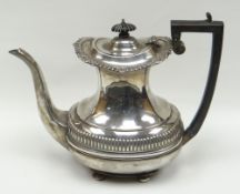 A silver coffee pot with composite handle and knop, Chester 1910, 21ozs gross