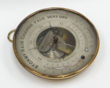 a brass encased circular dial aneroid `HOLOSTERIC BAROMETER' having alcohol and mercury thermometers
