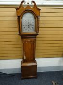 A late eighteenth century oak-cased eight-day Scottish longcase-clock having an arched silvered dial