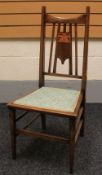 An Arts & Crafts style marquetry bedroom chair