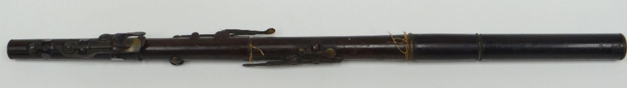 An antique rosewood flute, 63cms
