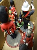 Six large painted figurines to include Coldstream Guardsman, Royal Marine and Goat Major