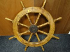 A nineteenth century wooden ship's wheel