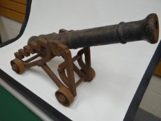 A British Victorian era signalling cannon with two foot long cast iron barrel with crest, stepped
