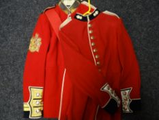 Two scarlet regimental tunics, one finely embroidered