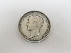 A scarce U.S. Presidential Silver Life Saving Medal awarded to a British seaman, reverse