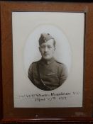 A framed and mounted photograph of posthumous V.C. winner, 2/Lt Rhodes-Moorhouse with 'A portrait by