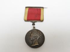 A China 1842 Medal to T. Miller Qr. Master Serg. 98th Regiment Foot with contemporary suspender