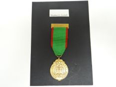 A hallmarked 9ct gold Glasgow Corporation Bravery Medal to Stephen G. Corbett