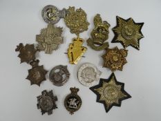 A quantity of regimental badge insignia
