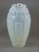 A Joblings relief moulded art glass vases with a top double band of flowers and leaves above an