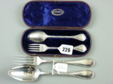 A cased silver fork and spoon pair, each piece with shaped and decorated handles, 2 ozs, London 1862