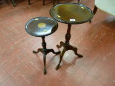 Two tripod mahogany wine tables with carved tray tops, one with Sheraton style fan inlay, 52 cms