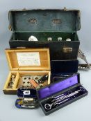 An early 20th Century doctor's bag and contents, a cased Norton's ophthalmoscope, ivory handled with