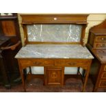 A circa 1900 inlaid and crossbanded mahogany marble topped washstand with twin frieze drawers and