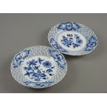 Meissen - two reticulated blue and white onion pattern cabinet plates, underglazed blue cross swords