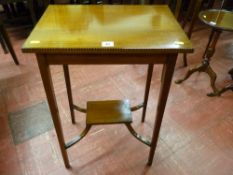 An Edwardian mahogany and line inlaid rectangular topped side table with chequer block edge