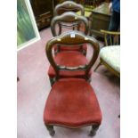 Three Victorian mahogany balloon back chairs with carved cross bar, turned reeded front supports and