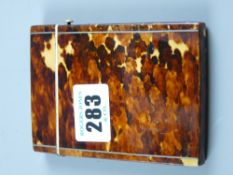 A tortoiseshell card case with silver mount to the lid and end hinge