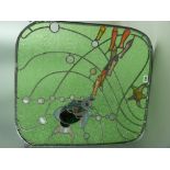 An art form leaded glass panel of stained glass fish amongst bubbles with green ripple textured