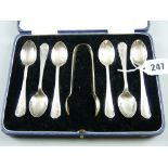 A cased set of six silver coffee spoons with sugar tongs, 3.2 ozs, Sheffield 1956/57