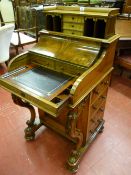 A super quality walnut Victorian piano top Davenport with patent pop-up top rising to reveal a