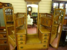 A good oak triple mirror dressing chest with pierced gallery sides incorporating two door corner